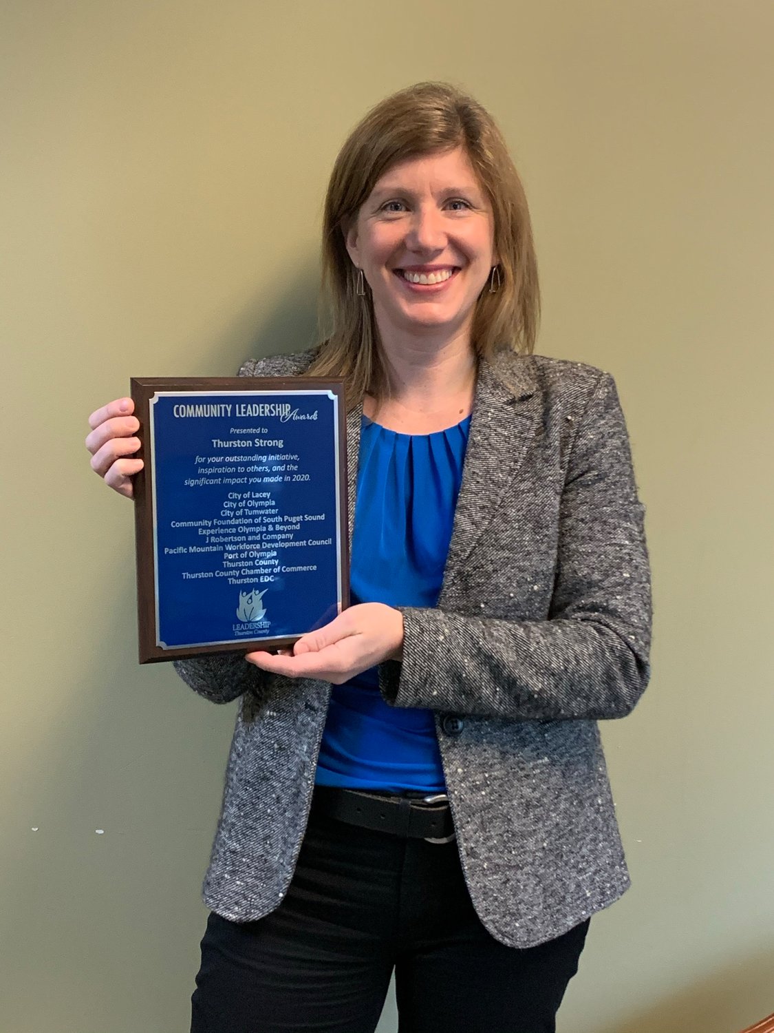 Mindie Reule, President and CEO of the Community Foundation of South Puget Sound, accepts the 2020 Community Leadership Award from Leadership Thurston County (LTC) for the organization's part in the Thurston Strong initiative.